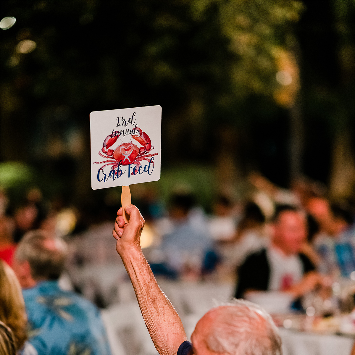 CASA Crab Feed Photos_Back of the Bidder's Sign with the CASA Crab Feed Logo
