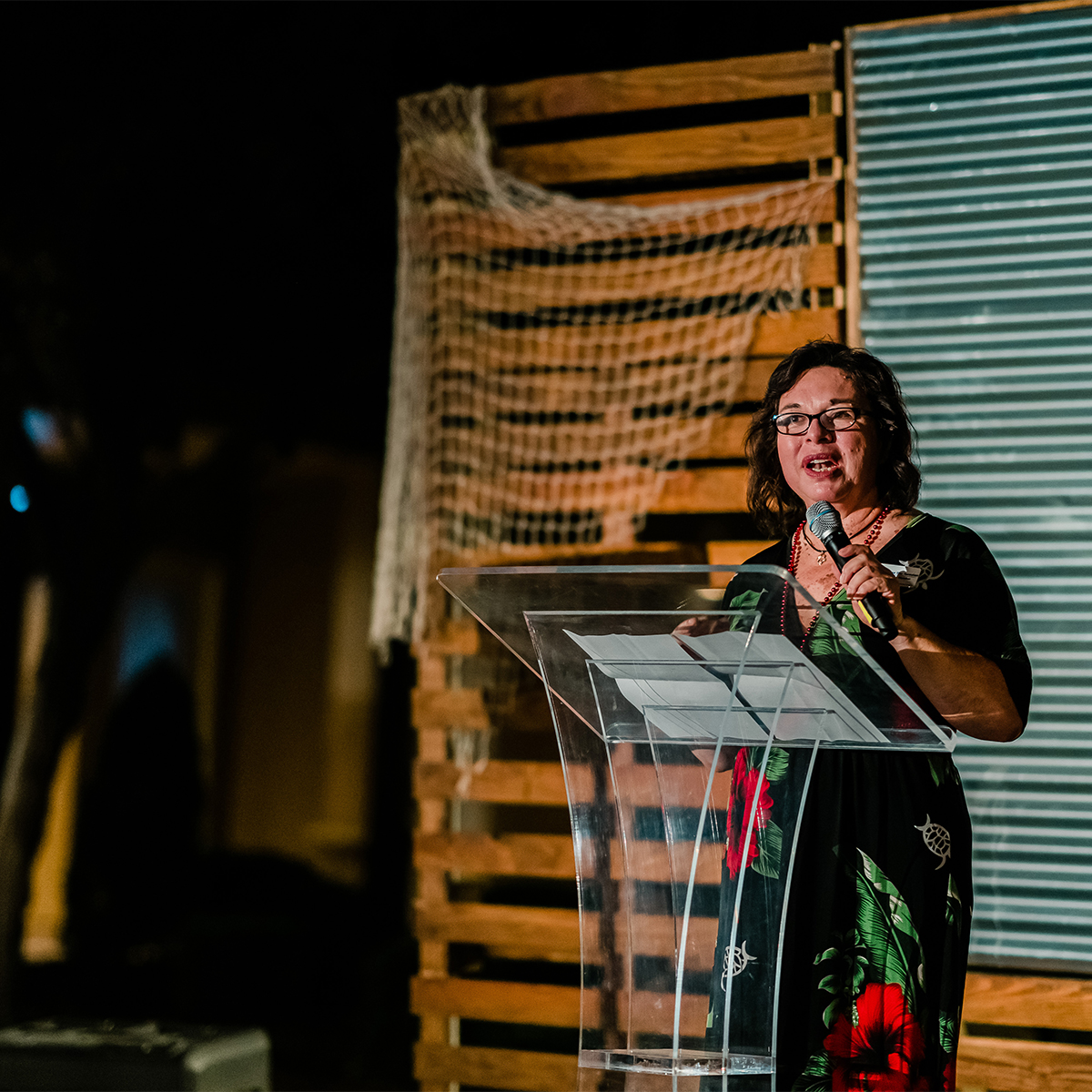 CASA Crab Feed Photos_Female CASA Advocate Giving a Speech at the Podium